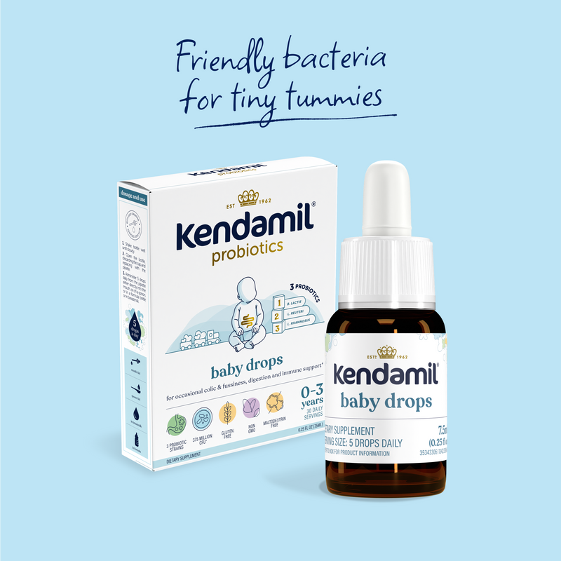 Kendamil probiotics baby drops packaging and bottle on a light blue background